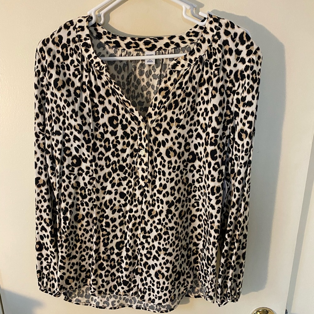 BRAND NEW. Leopard print blouse
